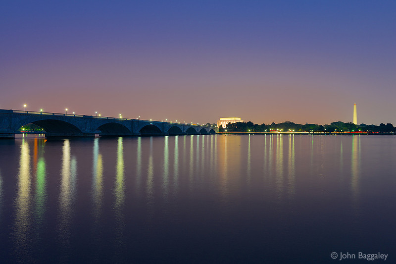 Photo by John Baggaley of Arlington Memorial Bridge and the Washington, DC, skyline at twilight.