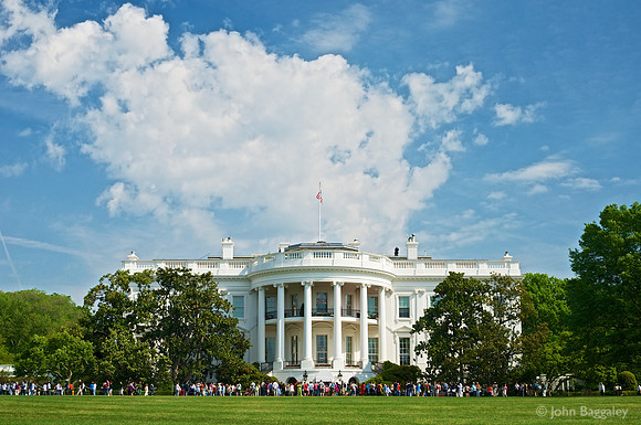 Billowing white clouds over the White House