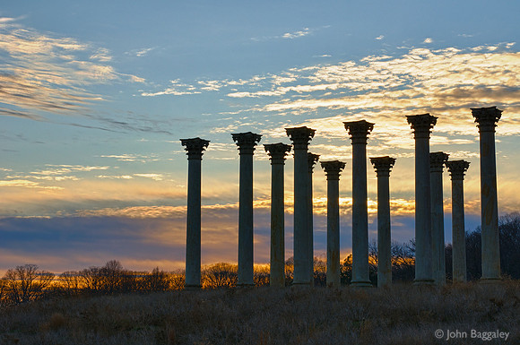 Sunset with a silhouette of the National Capitol Columns 2