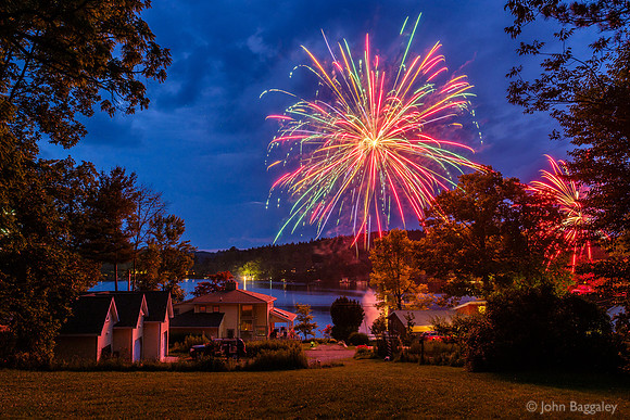 Fireworks bloom over Lake Wesauking